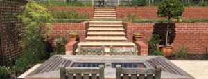 formal garden with brick built retaining walls and stone steps