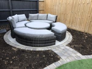 circular seating area in small garden