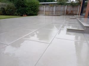 beautifull laid porcelain patio demonstrating the importance of pattern in garden design
