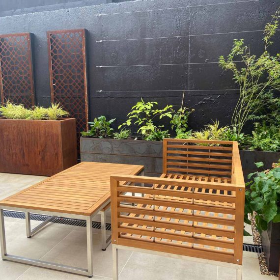 Attractive seating area in a paved garden
