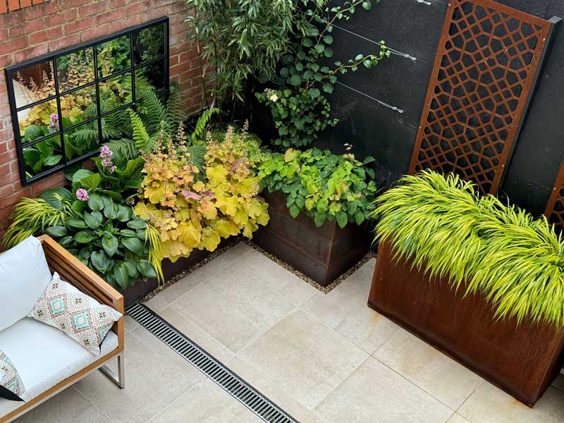 view of modern courtyard garden from upstairs window